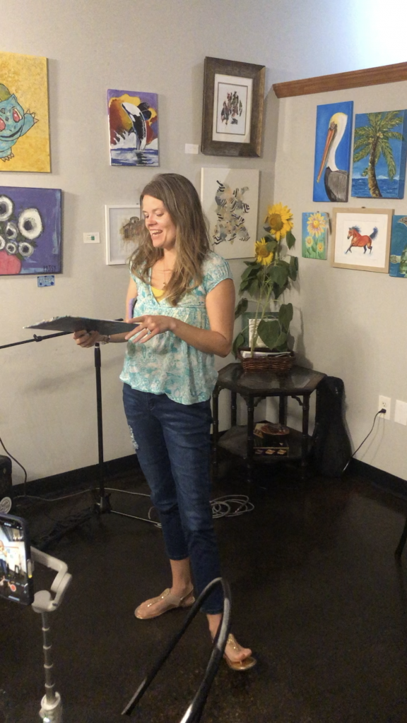 Sunflower Club Open Mic Night in South Florida, Eileen Anne reading poetry